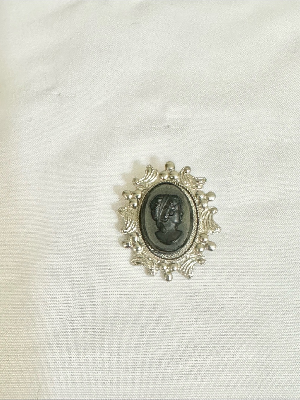 Vintage-Inspired Silver Cameo Brooch with Black Cameo